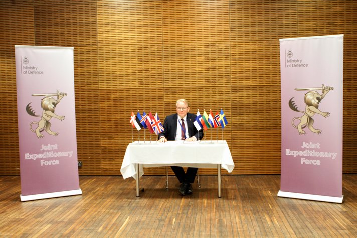 Mr. Peter Hultqvist sitting a table.