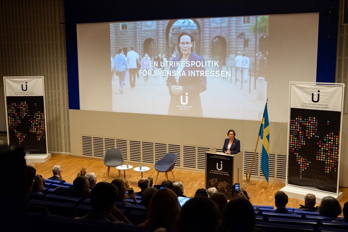 Minister for Foreign Affairs Maria Malmer Stenergard on a stage in front of an audience.