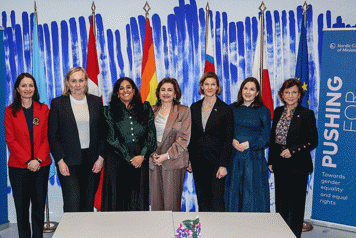 Minister for Gender Equality Nina Larsson stands with six women participating in a Nordic ministerial meeting in New York.