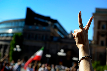 A hand in the air during a demonstration